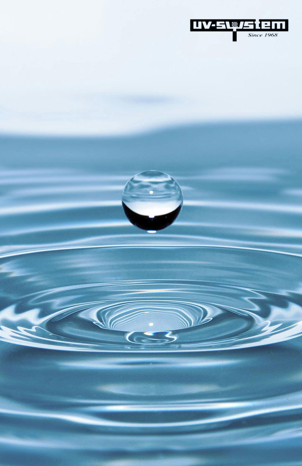 Image of a water droplet hitting water.