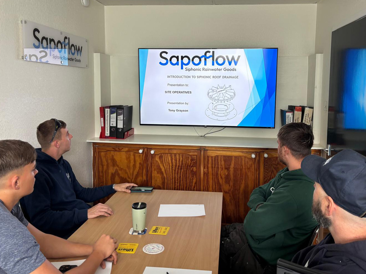 An team of people at Sapoflow's office.