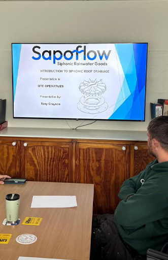An team of people at Sapoflow's office.